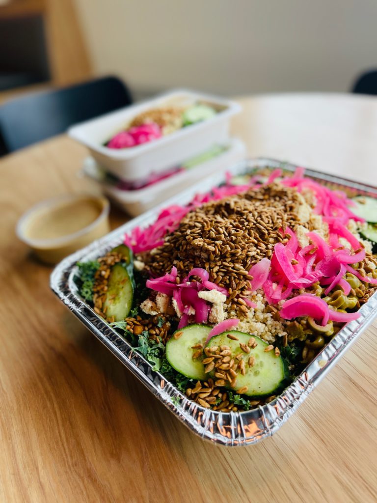 Plant Based and Delicious Med Bowl Inspired by the Anatolia region with Dark Leafy Greens Swiss Chard and Shredded Kale with House Vegan Feta Pickled Red Onions from Menu Mandala who makes the best food in Calgary