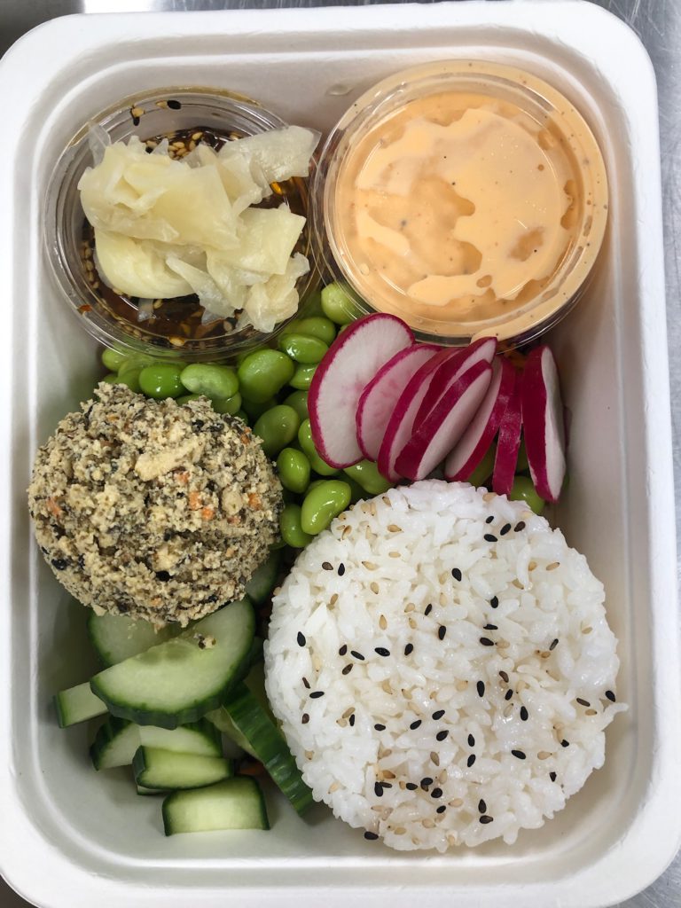 Plant Based and Delicious Sushi Bowl with No Salmon with seasoned cal rose rice pickled ginger and Spicy Aioli and Sesame Soy Sauce from Menu Mandala who makes the best food in Calgary