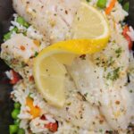 Lemon Garlic Butter Baked Haddock with sun dried tomato Rice  & vegetables